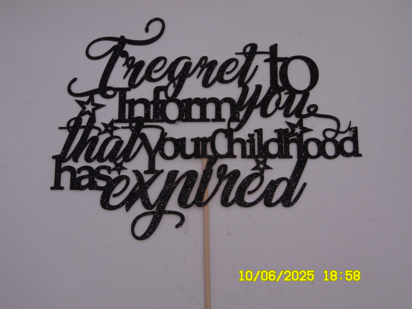 Glittery Black 'Regret to Inform You That Your Childhood Has Expired' Cake Topper
